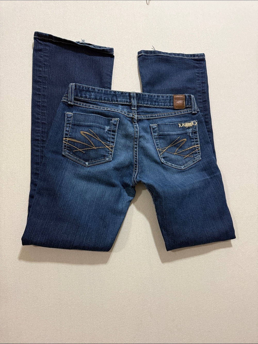 BKE Women’s Dark Blue Boot Cut Jeans with Embroidered Back Pockets